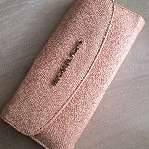 Michael Kors pink leather wallet like new with gold letters
