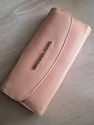 Michael Kors pink leather wallet like new with gold letters