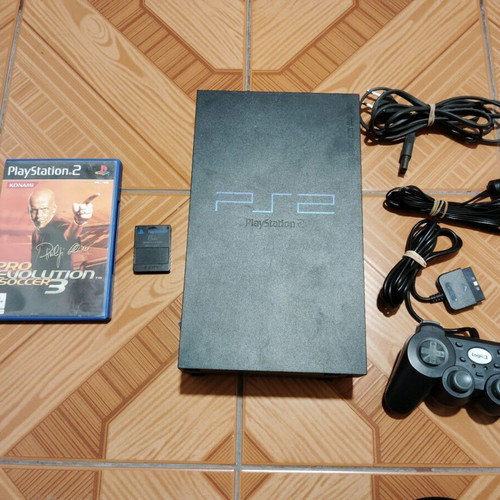 Sony PlayStation 2 used with memory card, game and controller