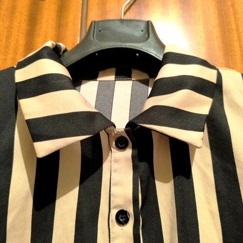 Women's shirt used with vertical stripes in beige and black