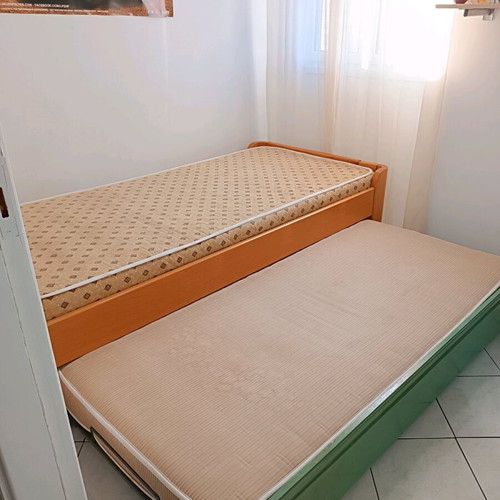 Single bed with used sliding bed and metal frame