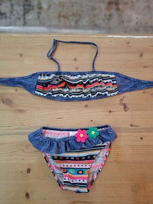 Girls' bikini with ruffles and decorative flowers size 4 like new