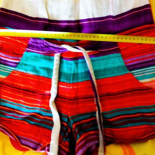 Medium strapless jumpsuit used, colorful, size 38 with belt