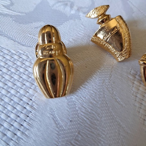 Avon collectible pins set of 4, like new, French perfumes