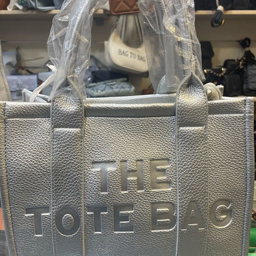 Silver large bag new with prints and detachable strap