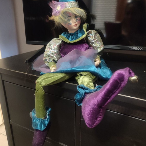 Harlequin porcelain music doll Symphony like new