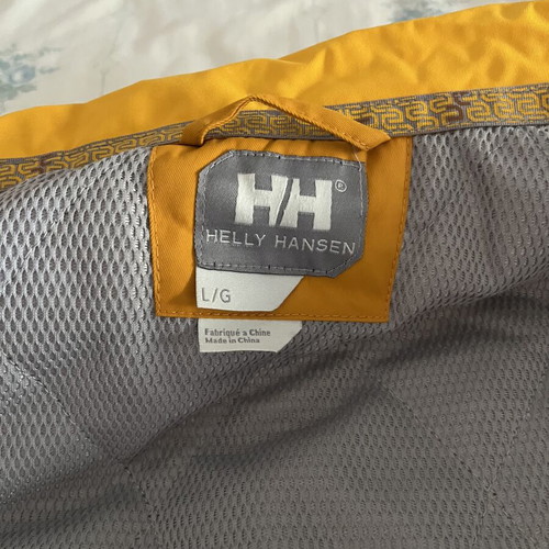 Helly Hansen jacket used, waterproof, warm, size L, yellow and orange