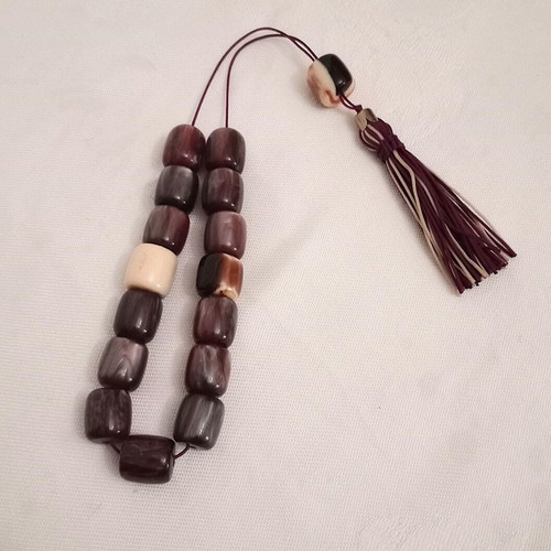 Worry beads with synthetic resin beads in purple color like new