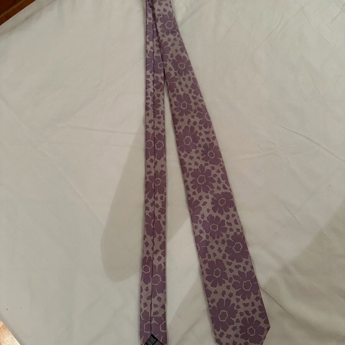 Tie new purple and turquoise with floral pattern