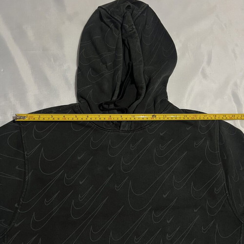 Nike black hoodie with Swoosh pattern, medium