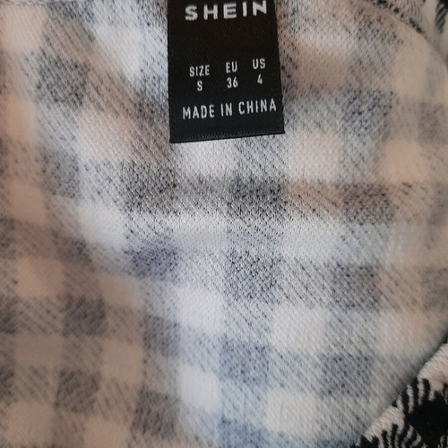 Shein checked mini skirt new, black and white with slit