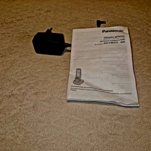 Panasonic phone with color screen and SIM card, like new