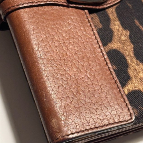 Dolce & Gabbana wallet used with leopard pattern and brown leather