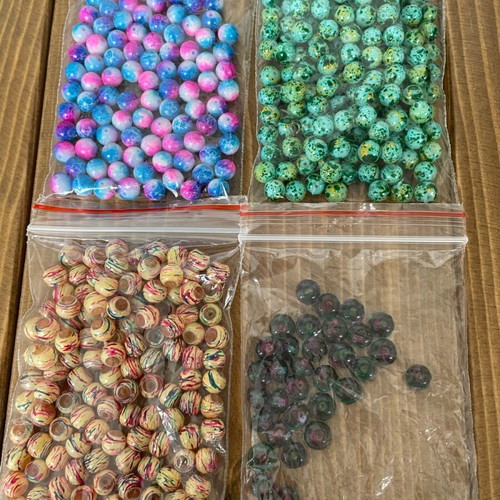 Beads pack like new, 4 bags multicolored