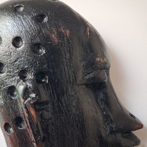 African wooden wall heads set of two used, black, hanging