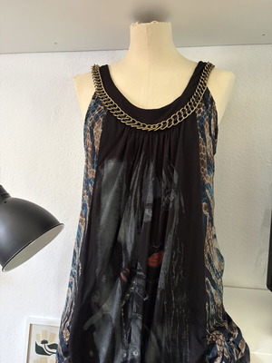 Paranoia mini dress size L like new, black with blue leopard print