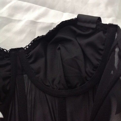 Women's black bustier corset top with sequins and sheer waist