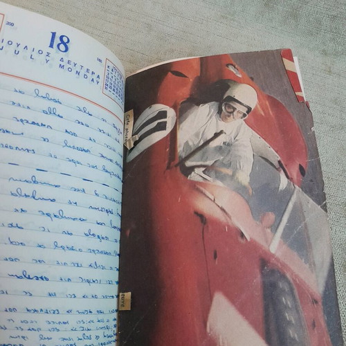Old 1960 calendar used with dried leaves and flowers