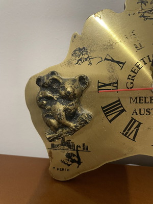 Vintage gold-plated wall clock with sculptures from Australia like new
