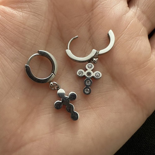 Silver huggie hoop earrings with rhinestone cross pendant