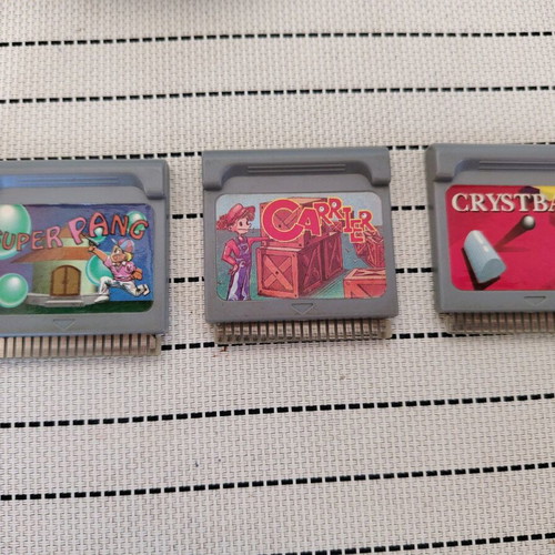 Watara Supervision console used with 3 games