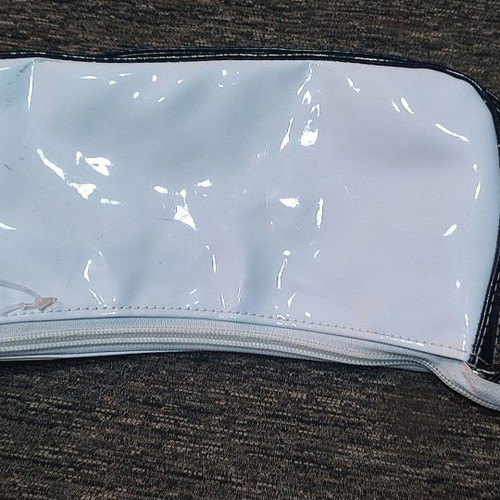 Handbag new with glossy texture and patterns