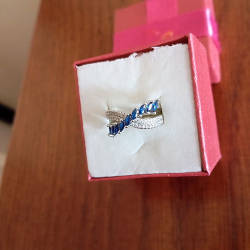 Ring new, gold plated with blue and silver zircon stones, size 7