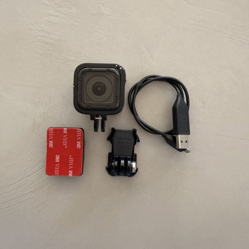 GoPro HERO4 Session action camera used with accessories and head strap