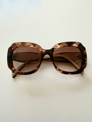 Prada women's sunglasses like new, tortoise acetate frame
