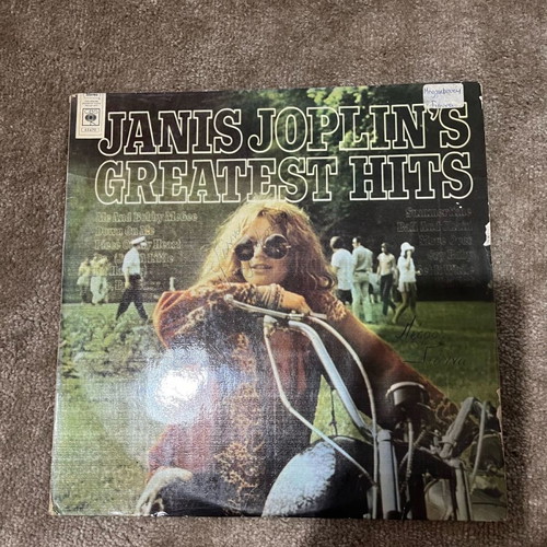 Janis Joplin Greatest Hits with visible cover wear