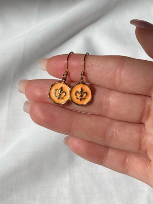 Handmade boho earrings made to order with orange and gold-plated steel charm