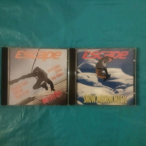 Escape Hot City Hits and Snow Motion Music CDs like new