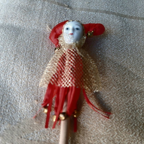 Decorative Harlequin figure on stick like new, red costume