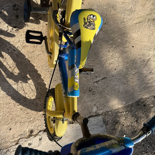 Kids BMX bike used, blue and yellow with snake design