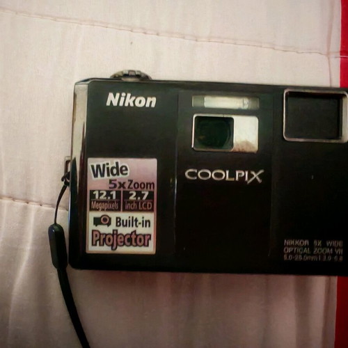 Nikon Coolpix S1000pj digital camera 12MP used with built-in projector