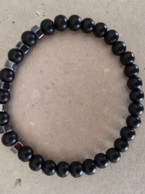 Unisex elastic bracelet with lava stones and metal elements like new