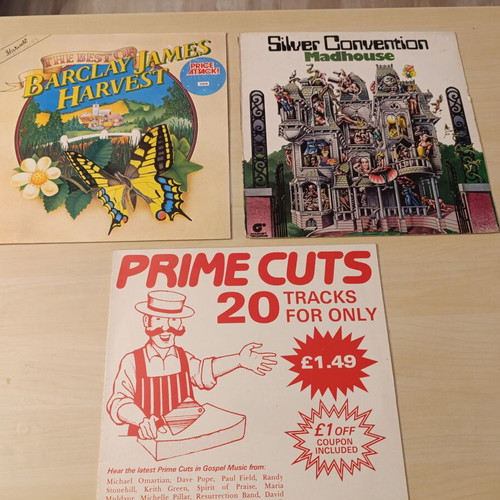 Collection of 3 vinyl records like new