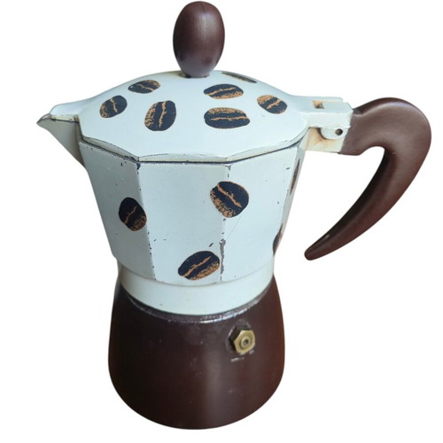 Espresso pot used with decorative coffee beans
