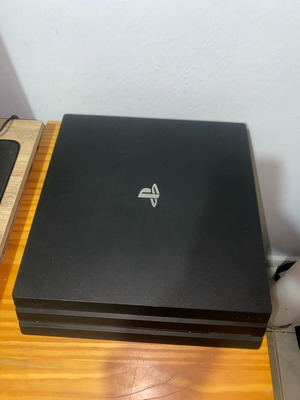 PlayStation 4 Pro like new 1TB with new controller and 4 games