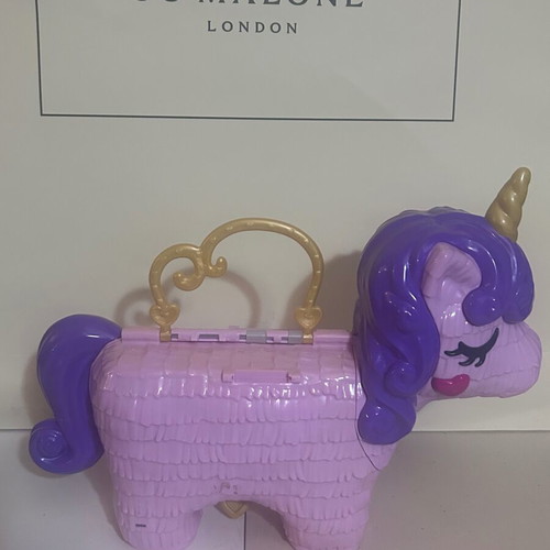 Polly Pocket Unicorn Party Playset used by Mattel