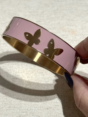 Loisir bracelet like new with pink enamel and butterfly details