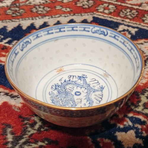 Classic Chinese rice porcelain bowl with dragon motif