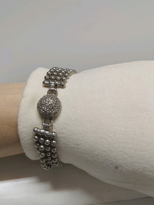 Vintage bracelet like new, silver with embossed texture