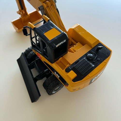 Bruder CAT Excavator used with wheels and shovel