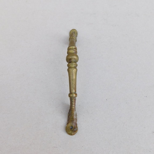 Bronze handle with embossed plant motifs 17.5 cm long