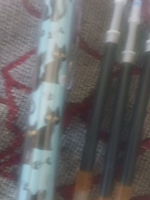 Blue pen with black cats, 4 refills, ink