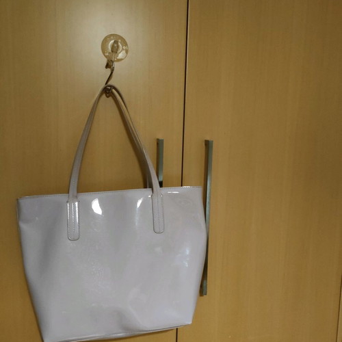 KEM shoulder bag used with imperfections near seams
