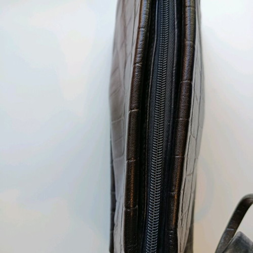 Black shoulder bag used with sturdy construction and multiple pockets