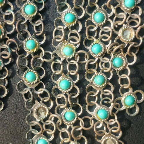 Vintage necklace used with turquoise stones and plated metal