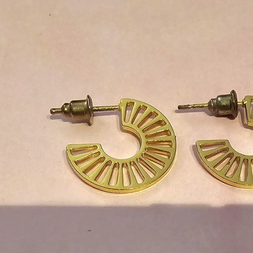 Modern earrings like new